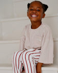 child wearing light lavender cotton slub long sleeve t-shirt