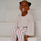 child wearing light lavender cotton slub long sleeve t-shirt
